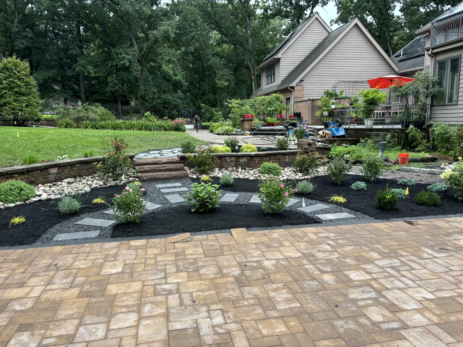 Backyard Landscape Design Wide by Down To Earth Landscaping.