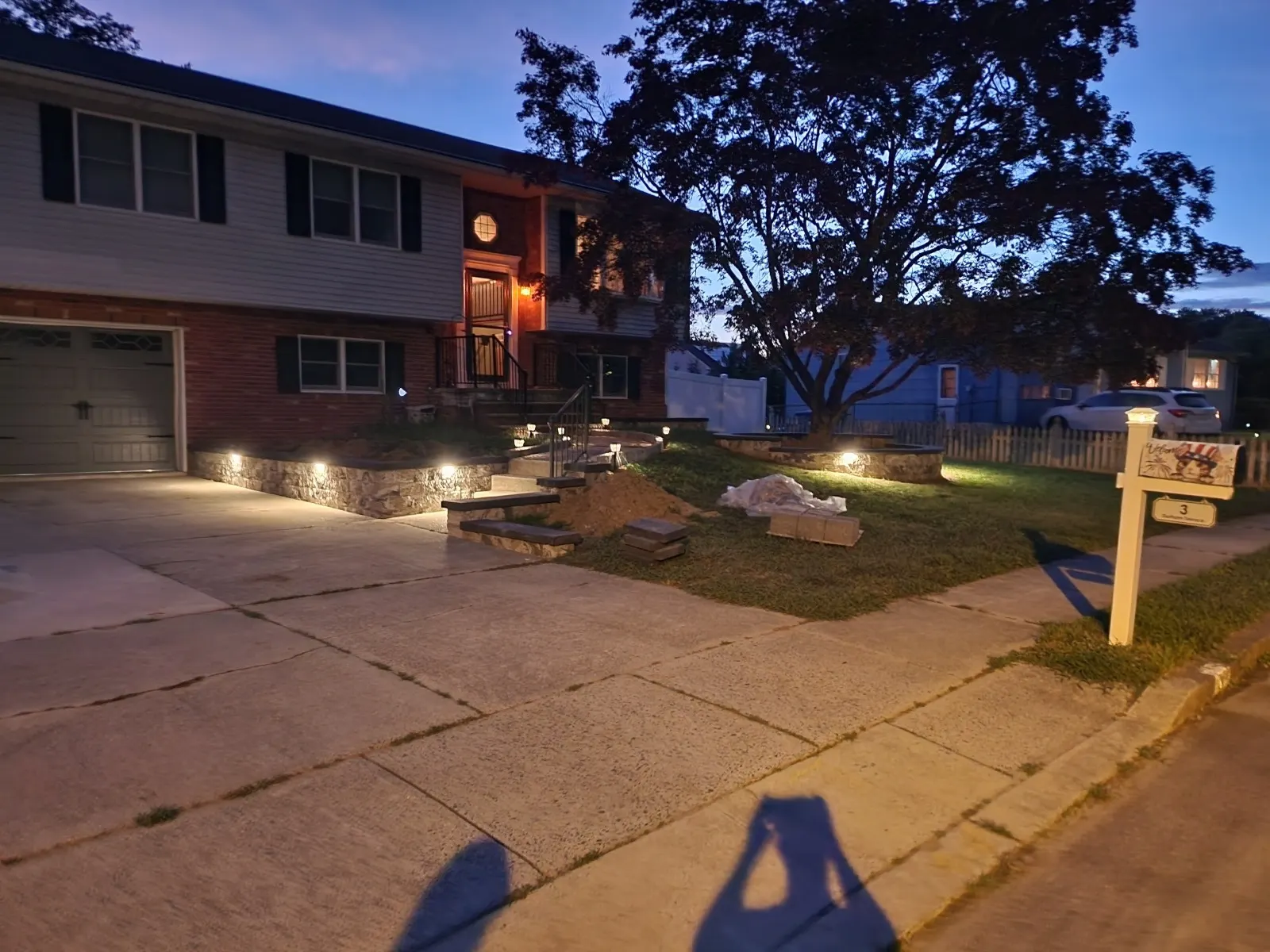 Retaining Wall Lighting Wide by Down To Earth Landscaping.